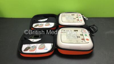 2 x CU Medical CU-SP1 Defibrillators with 2 x Batteries in Carry Cases (Both Power Up, 1 Battery Flat)