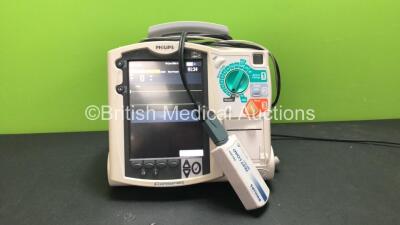 Philips MRx Defibrillator Including ECG and Printer Options with 1 x Philips M3538A Battery, 1 x Philips M3539A Module, 1 x Paddle Lead and 1 x Philips M3725A Test Load (Powers Up)