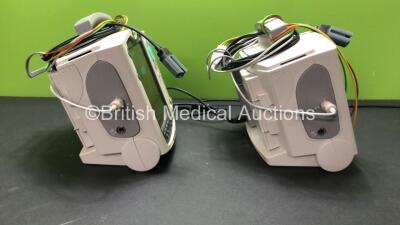 2 x Philips MRx Defibrillators Including Pacer, ECG and Printer Options with 2 x Philips M3538A Batteries, 2 x Philips M3539A Modules, 2 x Paddle Leads and 2 x 3 Lead ECG Leads (Both Power Up) *SN US00329924 - US00329922* - 4