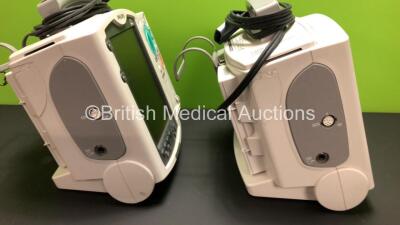 2 x Philips Heartstart MRx Defibrillators Including ECG and Printer Options with 2 x Paddle Leads and 2 x Philips M3725A Test Loads 2 x M3539A Modules and 2 x Philips M3538A Batteries *Mfd 2008 - 2008* (Both Power Up) - 2