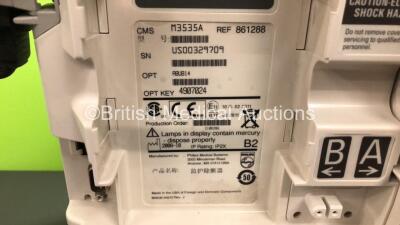 2 x Philips Heartstart MRx Defibrillators Including ECG and Printer Options with 2 x Paddle Leads and 2 x Philips M3725A Test Loads 2 x M3539A Modules and 2 x Philips M3538A Batteries *Mfd 2008 - 2008* (Both Power Up) - 5