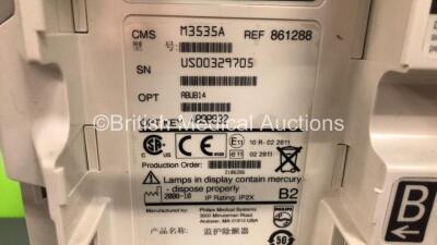 2 x Philips Heartstart MRx Defibrillators Including ECG and Printer Options with 2 x Paddle Leads and 2 x Philips M3725A Test Loads 2 x M3539A Modules and 2 x Philips M3538A Batteries *Mfd 2008 - 2008* (Both Power Up) - 6