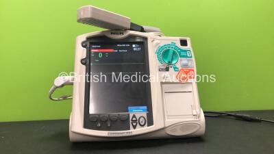 Philips MRx Defibrillator Including ECG and Printer Options with 1 x Philips M3538A Battery, 1 x Philips M3539A Module, 1 x Paddle Lead, 1 x 3 Lead ECG Lead and 1 x Philips M3725A Test Load (Powers Up) *SN US00322234*