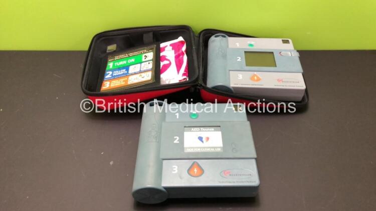 1 x Hewlett-Packard Heartstream Semi Automatic Defibrillator (Untested Due to No Battery) and 1 x Hewlett-Packard Heartstream AED Trainer *200033705 / 032299*