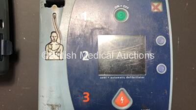 1 x Laerdal Heartstart FR2+ and 1 x Laerdal Heartstart FR2 Defibrillators for Spares / Repairs - 2