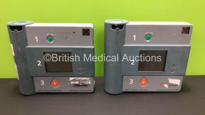 1 x Hewlett Packard Heartstream Semi Automatic Defibrillator and 1 x Laerdal Heartstart FR Defibrillator (Both Power Up when Tested with Stock Batteries)