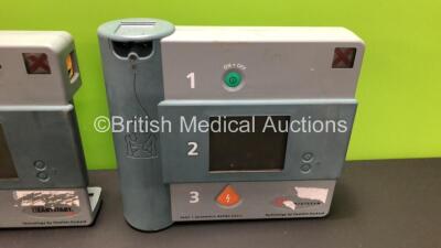 1 x Hewlett Packard Heartstream Semi Automatic Defibrillator and 1 x Laerdal Heartstart FR Defibrillator (Both Power Up when Tested with Stock Batteries) - 2