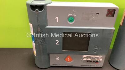 1 x Hewlett Packard Heartstream Semi Automatic Defibrillator and 1 x Laerdal Heartstart FR Defibrillator (Both Power Up when Tested with Stock Batteries) - 3