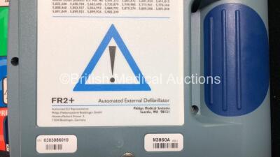 2 x Philips Heartstart FR2+ Defibrillators in Carry Cases with 2 x Batteries *Install Dates 02-2022 / 04-2017* (Both Power Up and Pass Self Test) *0303086010 - 0107220088* - 4