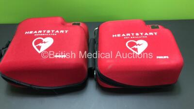 2 x Philips Heartstart FR2+ Defibrillators in Carry Cases with 2 x Batteries *Install Dates 12-2023 / 12-2019* (Both Power Up and Pass Self Test) *0510800675 - 0911891312* - 5