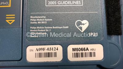 3 x Philips Heartstart HS1 Defibrillators with 3 x Carry Cases and 3 x Batteries (All Power Up) *A09F 03140 - A09F 03138 - A09F 03124* - 8