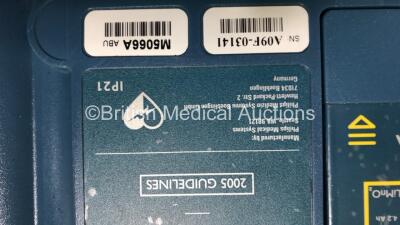 3 x Philips Heartstart HS1 Defibrillators with 3 x Carry Cases and 3 x Batteries (All Power Up) *A09F 03141 - A11D 05898 - A09J 04458* - 8