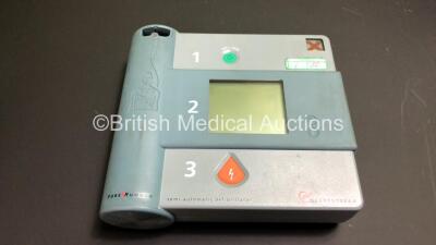 2 x Heartstream Semi Automatic Defibrillators with 2 x Philips Ref BT1 Batteries (1 Powers Up with Alarm and Blank Screen, 1 No Power) *000001231 / 000011830* - 2