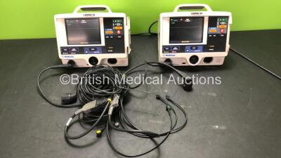 2 x Medtronic Lifepak 20 Defibrillator / Monitors with ECG and Printer Options, 2 x Paddle Leads and 2 x 3 Lead ECG Leads (Both Power Up 1 with Missing Door-See Photo)