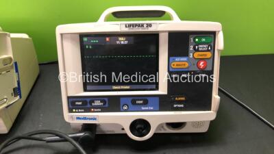 2 x Medtronic Lifepak 20 Defibrillator / Monitors with ECG and Printer Options, 2 x Paddle Leads and 2 x 3 Lead ECG Leads (Both Power Up 1 with Missing Door-See Photo) - 3