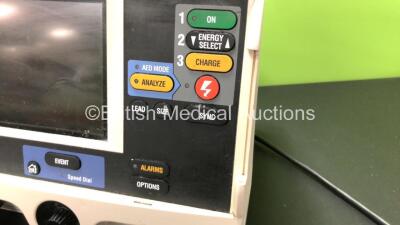 2 x Medtronic Lifepak 20 Defibrillator / Monitors with ECG and Printer Options, 2 x Paddle Leads and 2 x 3 Lead ECG Leads (Both Power Up 1 with Missing Door-See Photo) - 4