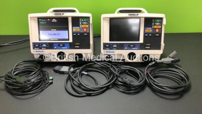 2 x Medtronic Lifepak 20 Defibrillators / Monitor Including ECG and Printer Options with 2 x Paddle Leads and 2 x ECG Leads *Mfd 2006 - 2006* (1 x Powers Up, 1 No Power)