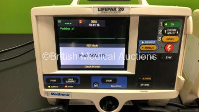 2 x Medtronic Lifepak 20 Defibrillators / Monitor Including ECG and Printer Options with 2 x Paddle Leads and 2 x ECG Leads *Mfd 2006 - 2006* (1 x Powers Up, 1 No Power) - 2