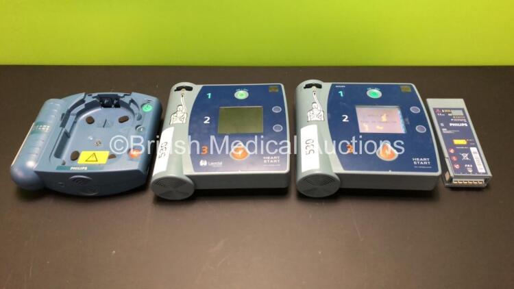 Job Lot Including 1 x Philips HeartStart FR2+ Defibrillator (Powers Up and Passes Self Test with Stock Battery - Some Damage to Display - See Photo) 1 x Laerdal HeartStart FR2+ Defibrillator (Powers Up Failing Self Test) 1 x Philips M3863A Battery (Flat)