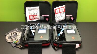 2 x Philips HeartStart FR3 Defibrillators in Cases with 2 x Batteries * Install Before 2022 - 2024 * (Both Power Up) * SN C18G 002257 - C17A 00173*