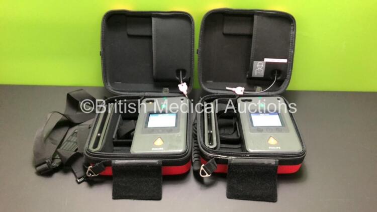 2 x Philips HeartStart FR3 Defibrillators in Cases with 2 x Batteries * Install Before 2024 - 2023 * (Both Power Up) * SN C15C 01049 - C18G 01329*