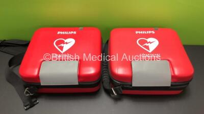 2 x Philips HeartStart FR3 Defibrillators in Cases with 2 x Batteries * Install Before 2024 - 2023 * (Both Power Up) * SN C15C 01049 - C18G 01329* - 8