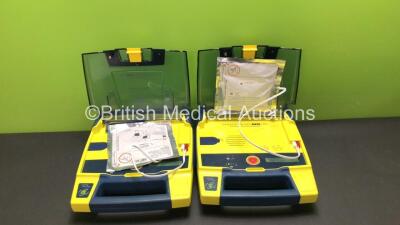 2 x Cardiac Science Powerheart AED G3 Automated External Defibrillators with 2 x Batteries (Both Power Up) *SN 4121800 - 4121756*