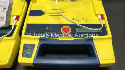 2 x Cardiac Science Powerheart AED G3 Automated External Defibrillators with 2 x Batteries (Both Power Up) *SN 4121800 - 4121756* - 2