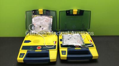 2 x Cardiac Science Powerheart AED G3 Automated External Defibrillators with 2 x Batteries (Both Power Up) *SN 4121791 - 4121790*