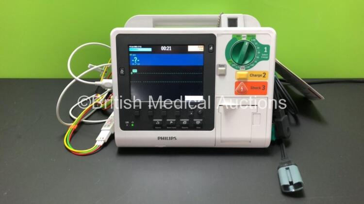 Philips Heartstart XL+ Defibrillator *Mfd - 06/2013* with ECG, Pacer and Printer Options, 3 Lead ECG Lead and Paddle Lead (Powers Up) *US61305792*