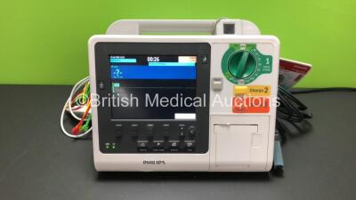 Philips Heartstart XL+ Defibrillator *Mfd - 03/2013* with ECG, Pacer and Printer Options, 3 Lead ECG Lead and Paddle Lead (Powers Up) *US31304766*