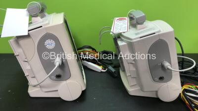 2 x Philips MRx Defibrillators Including Pacer, ECG and Printer Options with 2 x Philips M3538A Batteries, 2 x Philips M3539A Modules, 2 x Paddle Leads and 2 x 3 Lead ECG Leads (Both Power Up) *SN US0032223768 - US00322235 - 307713 - 307720* - 4