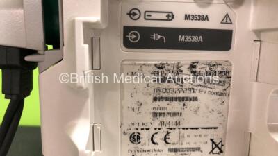 2 x Philips MRx Defibrillators Including Pacer, ECG and Printer Options with 2 x Philips M3538A Batteries, 2 x Philips M3539A Modules, 2 x Paddle Leads and 2 x 3 Lead ECG Leads (Both Power Up) *SN US0032223768 - US00322235 - 307713 - 307720* - 7