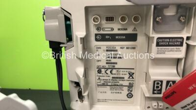 2 x Philips MRx Defibrillators Including Pacer, ECG and Printer Options with 2 x Philips M3538A Batteries, 2 x Philips M3539A Modules, 2 x Paddle Leads, 2 x Philips M3725A Test Loads and 2 x 3 Lead ECG Leads (Both Power Up) *SN US00332946 - US00214824* - 7