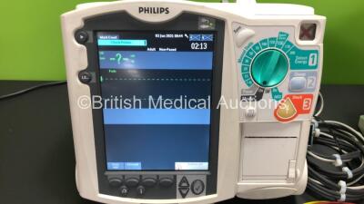 2 x Philips Heartstart MRx Defibrillators Including 2 x Pacer, 2 x ECG, 1 x BP, 1 x SpO2 and 2 x Printer Options with 2 x Philips M3538 Modules, 2 x Paddle Leads and 1 x ECG Lead *Mfd Both 2008* (Both Power Up) *US00326440 - US00322671* - 2