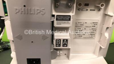 2 x Philips Heartstart MRx Defibrillators Including 2 x Pacer, 2 x ECG, 1 x BP, 1 x SpO2 and 2 x Printer Options with 2 x Philips M3538 Modules, 2 x Paddle Leads and 1 x ECG Lead *Mfd Both 2008* (Both Power Up) *US00326440 - US00322671* - 6