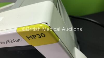 2 x Philips IntelliVue MP30 Patient Monitors *Mfds - 2008* with 2 x Philips M3012A Multiparameter Modules with Press and Temp Options *Mfds - 2009* and 2 x Philips IntelliVue X2 Patient Monitors with Press, Temp, NBP, SPO2 and ECG Resp Options and 2 x Bat - 7