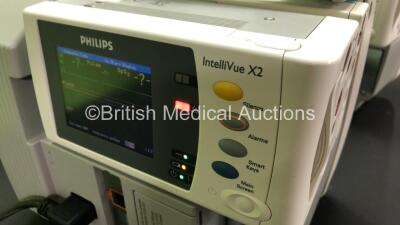 2 x Philips IntelliVue MP30 Patient Monitors *Mfds - 2008* with 2 x Philips M3012A Multiparameter Modules with Press and Temp Options *Mfds - 2008* and 2 x Philips IntelliVue X2 Patient Monitors with Press, Temp, NBP, SPO2 and ECG Resp Options and 2 x Bat - 9