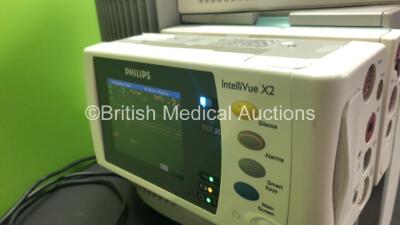 2 x Philips IntelliVue MP70 Anaesthesia Patient Monitors *Mfds - 2009* with 2 x Philips M3012A Multiparameter Modules with Press and Temp Options *Mfds - 2012 and 2008* and 2 x Philips IntelliVue X2 Patient Monitors with Press, Temp, NBP, SPO2 and ECG Res - 7