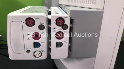 2 x Philips IntelliVue MP70 Anaesthesia Patient Monitors *Mfds - 2009 and 2009* (Both Power Up) with 2 x Philips M3014A Opt : C07 Multiparameter Modules with Press, Temp and CO2 Options *Mfds - 2006 and 2008* and 2 x Philips IntelliVue X2 Patient Monitors - 3