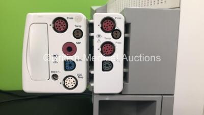 2 x Philips IntelliVue MP70 Anaesthesia Patient Monitors *Mfds - 2009 and 2009* (Both Power Up) with 2 x Philips M3014A Opt : C07 Multiparameter Modules with Press, Temp and CO2 Options *Mfds -2008 and 2010 * and 2 x Philips IntelliVue X2 Patient Monitors - 2