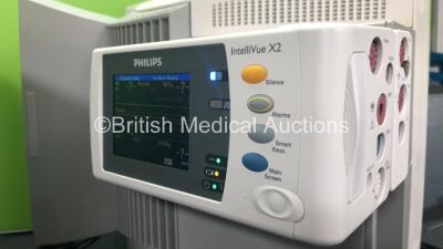 2 x Philips IntelliVue MP70 Anaesthesia Patient Monitors *Mfds -2009 and 2009* (Both Power Up 1 with Missing Dial-See Photos) with 2 x Philips M3014A Opt : C07 Multiparameter Modules with Press, Temp and CO2 Options *Mfds -2011* and 2 x Philips IntelliVue - 9
