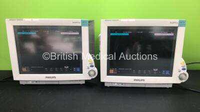 2 x Philips IntelliVue MP70 Anaesthesia Patient Monitors *Mfds -2010 and 2010* (Both Power Up) with 1 x Philips M3014A Opt : C10 Multiparameter Module with Press, Temp, ECG and CO2 Options and 1 x Multiparameter Module with Press, Temp, ECG and CO2 Option