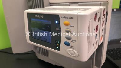 2 x Philips IntelliVue MP70 Anaesthesia Patient Monitors *Mfds -2010 and 2010* (Both Power Up) with 1 x Philips M3014A Opt : C10 Multiparameter Module with Press, Temp, ECG and CO2 Options and 1 x Multiparameter Module with Press, Temp, ECG and CO2 Option - 10