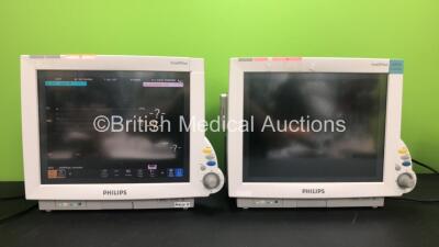 2 x Philips IntelliVue MP70 Anaesthesia Patient Monitors *Mfds - 2009 and 2009* (Both Power Up, 1 with Missing Tag-See Photo) with 2 x Philips M3014A Opt : C10 Multiparameter Modules with Press, Temp, CO2 and PICCO Options *Mfds - 2008* and 2 x Philips In