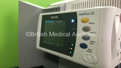 2 x Philips IntelliVue MP70 Anaesthesia Patient Monitors *Mfds - 2009 and 2009* (Both Power Up, 1 with Missing Tag-See Photo) with 2 x Philips M3014A Opt : C10 Multiparameter Modules with Press, Temp, CO2 and PICCO Options *Mfds - 2008* and 2 x Philips In - 9