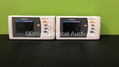 2 x Philips IntelliVue X2 Patient Monitors with Press, Temp, NBP, SPO2 and ECG Resp Options and 2 x Batteries *Mfds - 1 x 2009, 1 x Missing Label* (Both Power Up)