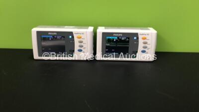 2 x Philips IntelliVue X2 Patient Monitors with Press, Temp, NBP, SPO2 and ECG Resp Options and 2 x Batteries *Mfds - 1 x 2010, 1 x Missing Label* (Both Power Up, 1 Missing Battery Cover and Damaged Casing - See Photos)