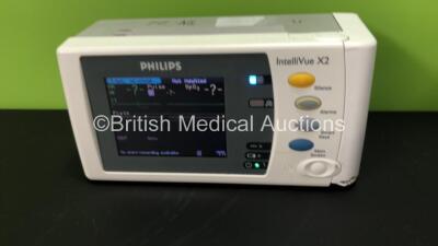 2 x Philips IntelliVue X2 Patient Monitors with Press, Temp, NBP, SPO2 and ECG Resp Options and 2 x Batteries *Mfds - 1 x 2010, 1 x Missing Label* (Both Power Up, 1 Missing Battery Cover and Damaged Casing - See Photos) - 4