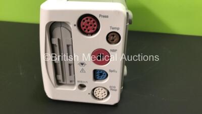 2 x Philips IntelliVue X2 Patient Monitors with Press, Temp, NBP, SPO2 and ECG Resp Options and 2 x Batteries *Mfds - 1 x 2010, 1 x Missing Label* (Both Power Up, 1 Missing Battery Cover and Damaged Casing - See Photos) - 5